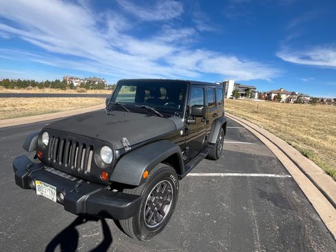 Used 2011 Jeep Wrangler Unlimited Sport image 1