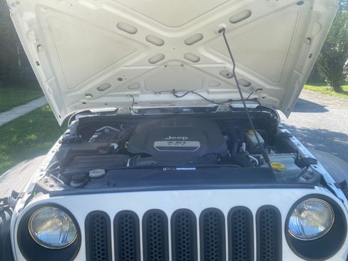 Used 2012 Jeep Wrangler Sport w/ Connectivity Group AWD/4WD image 12