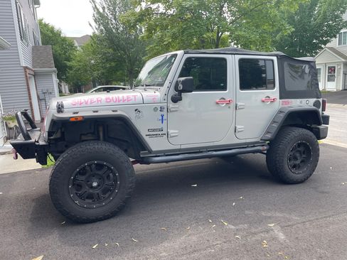 Used 2012 Jeep Wrangler Unlimited Sport AWD/4WD image 2