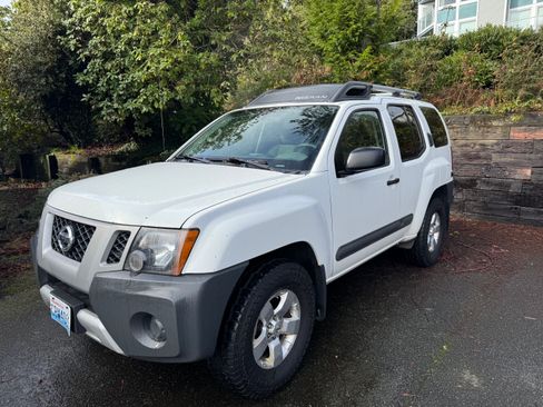 Used 2013 Nissan Xterra S image 1