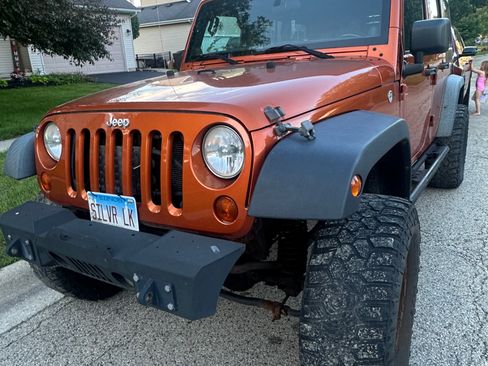 Used 2011 Jeep Wrangler Unlimited Sport AWD/4WD image 1