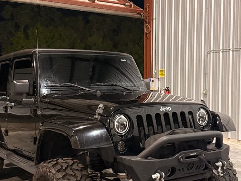 Used 2015 Jeep Wrangler Unlimited Sahara w/ Max Tow Package image 1