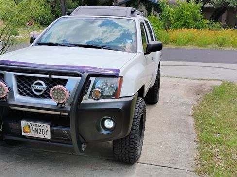 Used 2014 Nissan Xterra X AWD/4WD image 1