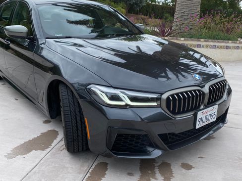 Used 2022 BMW M550i xDrive w/ Premium Package image 1
