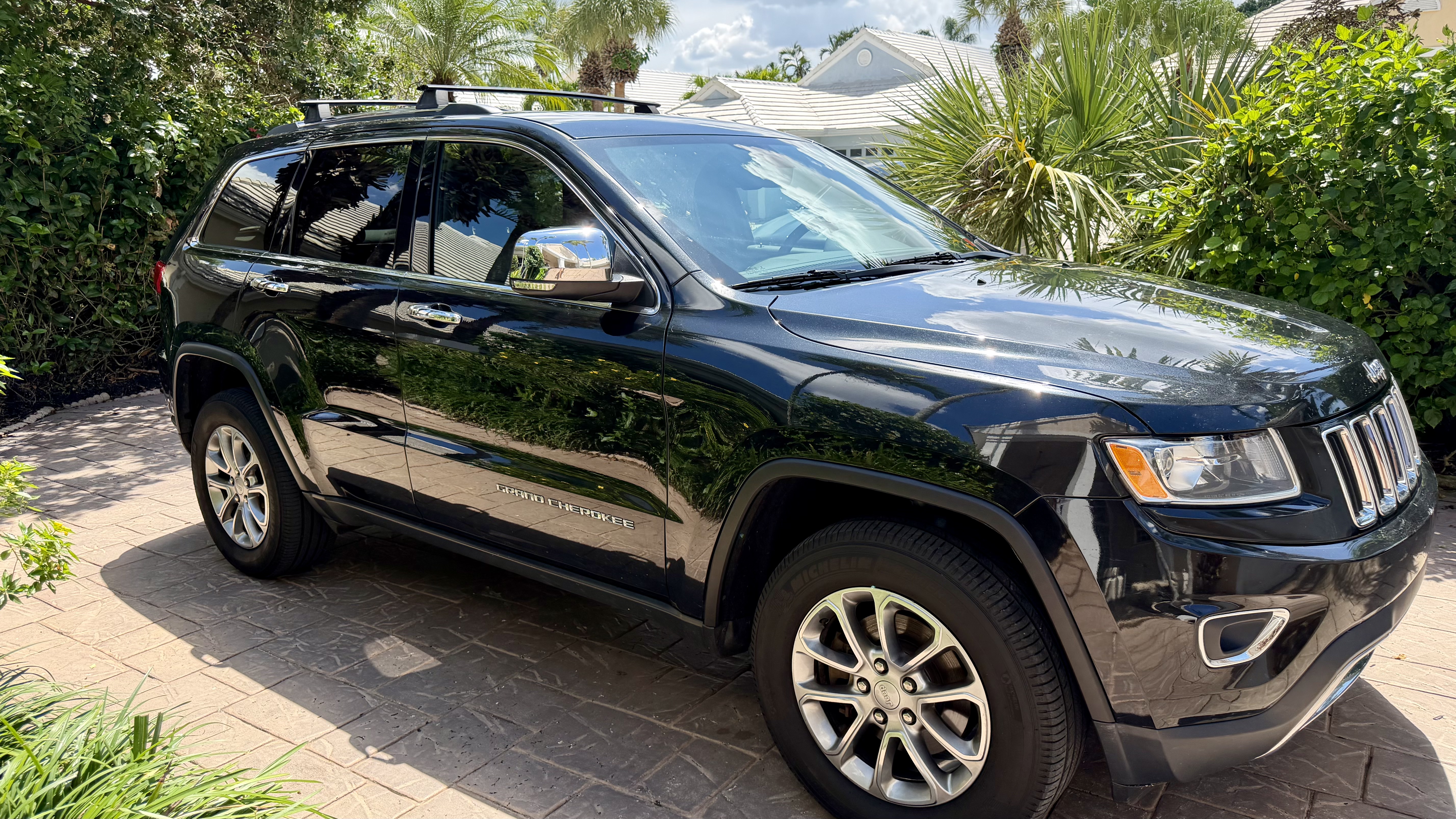 Used 2016 Jeep Grand Cherokee Limited AWD/4WD image 1