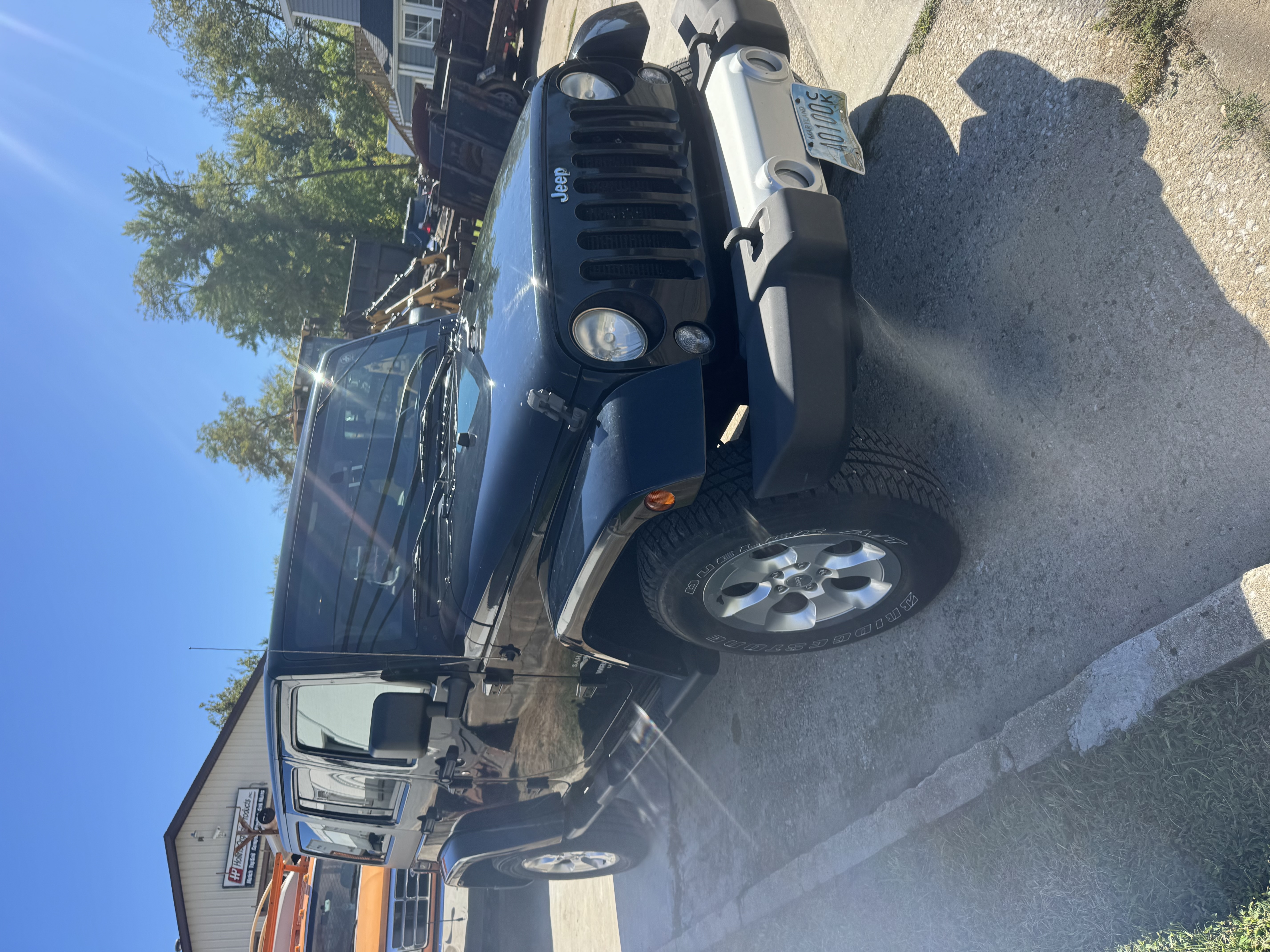 Used 2014 Jeep Wrangler Unlimited Sahara w/ Dual Top Group AWD/4WD image 2