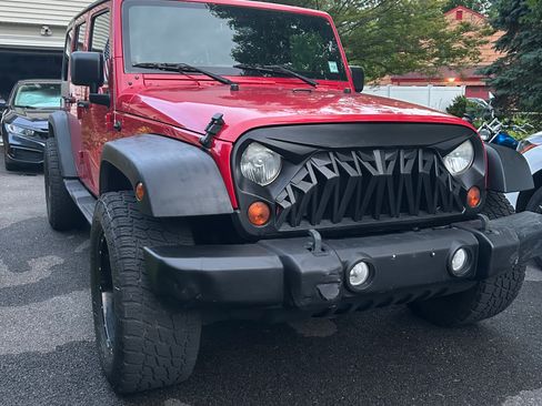 Used 2011 Jeep Wrangler Unlimited Sport AWD/4WD image 2