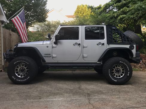 Used 2012 Jeep Wrangler Unlimited Sport AWD/4WD image 1