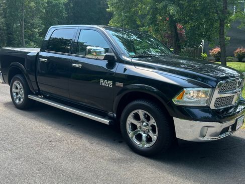 Used 2015 RAM 1500 Laramie w/ Convenience Group AWD/4WD image 1