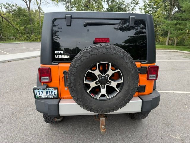 Used 2012 Jeep Wrangler Unlimited Sahara w/ Dual Top Group AWD/4WD image 15