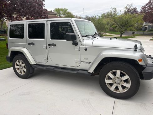 Used 2011 Jeep Wrangler Unlimited 70th Anniversary w/ Dual Top Group AWD/4WD image 4
