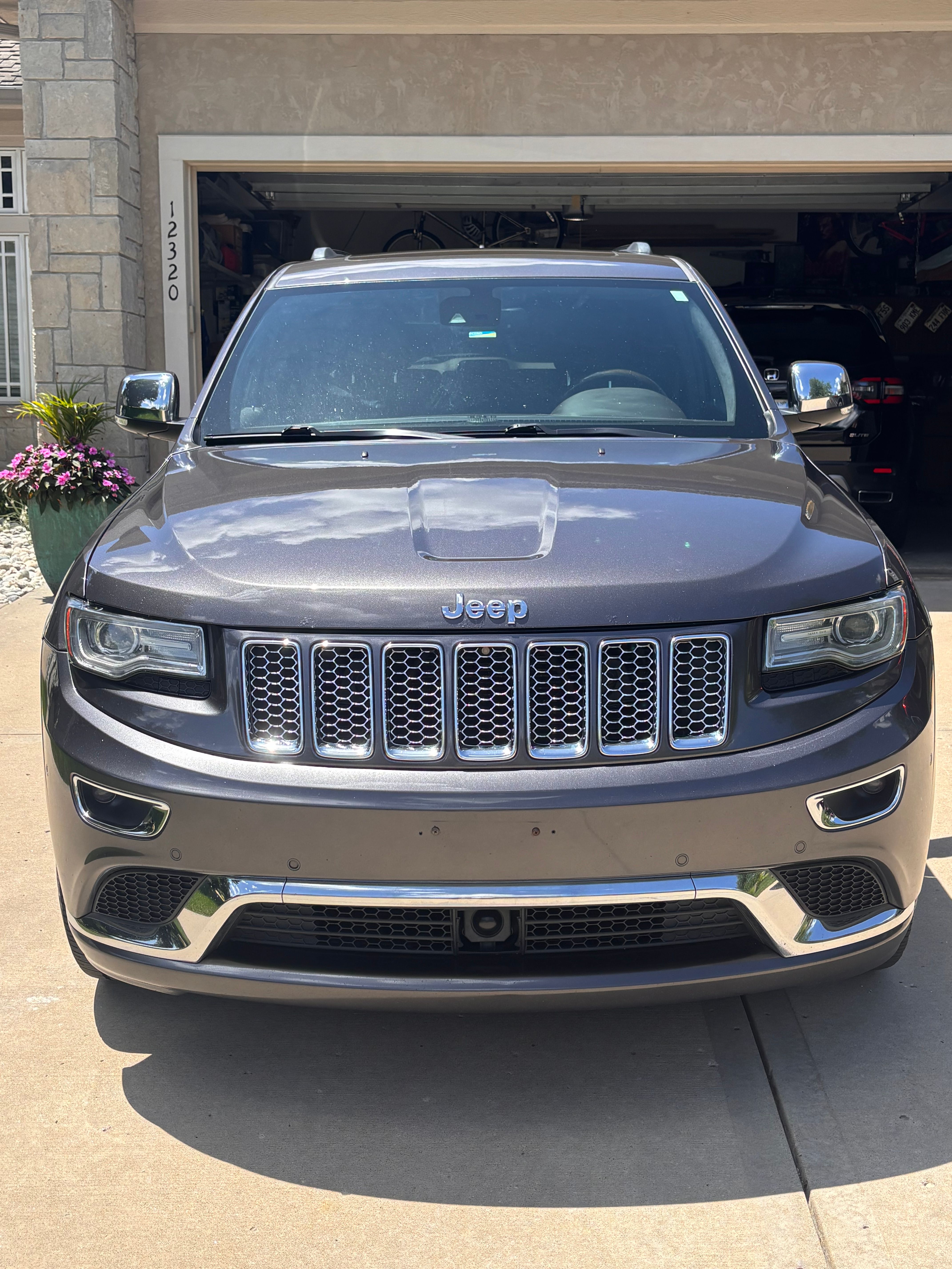 Used 2014 Jeep Grand Cherokee Summit AWD/4WD image 1