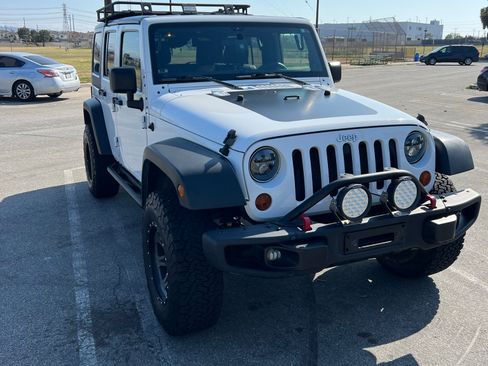 Used 2012 Jeep Wrangler Unlimited Sport w/ PWR Convenience Group image 2