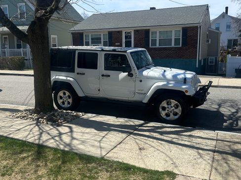 Used 2013 Jeep Wrangler Unlimited Sahara w/ Dual Top Group image 1