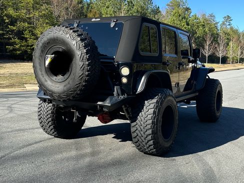 Used 2012 Jeep Wrangler Unlimited Rubicon w/ Dual Top Group image 8