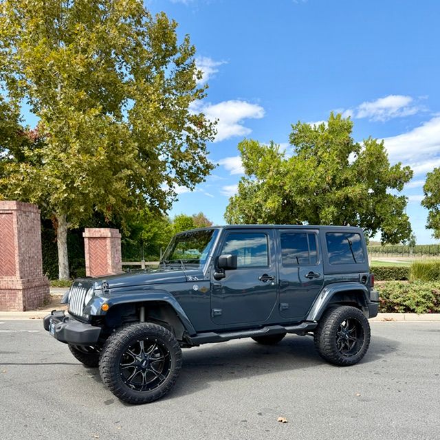 Used 2016 Jeep Wrangler Unlimited Sahara w/ Connectivity Group AWD/4WD image 1