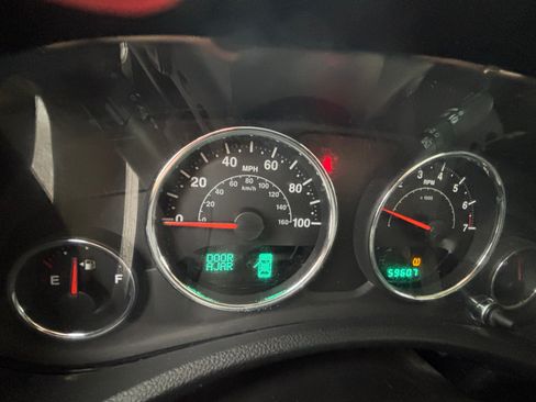 Used 2012 Jeep Wrangler Unlimited Sahara w/ Dual Top Group image 9