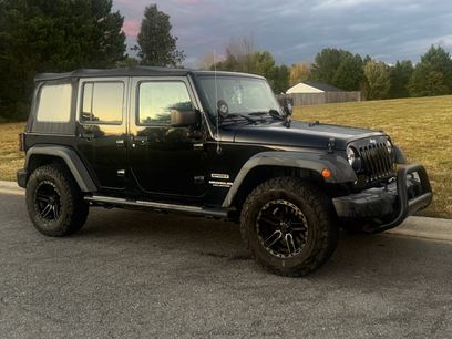 Used 2016 Jeep Wrangler Unlimited Sport w/ Mopar Black Appearance Group