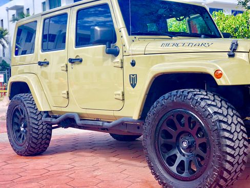 Used 2013 Jeep Wrangler Unlimited Sahara w/ Mopar Chrome Edition Group image 1