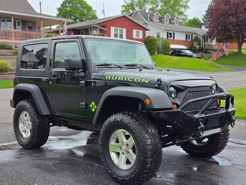 Used 2009 Jeep Wrangler Rubicon w/ Dual Top Group AWD/4WD image 1