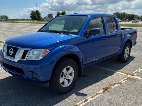 Used 2012 Nissan Frontier SV w/ SV Premium Utility Pkg AWD/4WD image 1