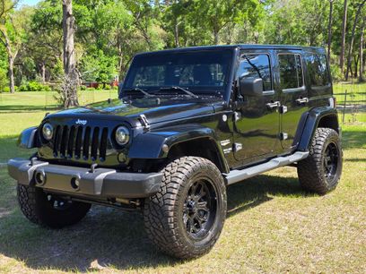 Used 2015 Jeep Wrangler Unlimited Sahara w/ Dual Top Group