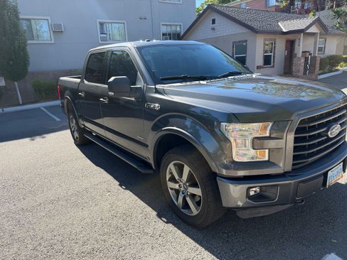 Used 2015 Ford F150 XLT w/ Equipment Group 302A Luxury AWD/4WD image 1
