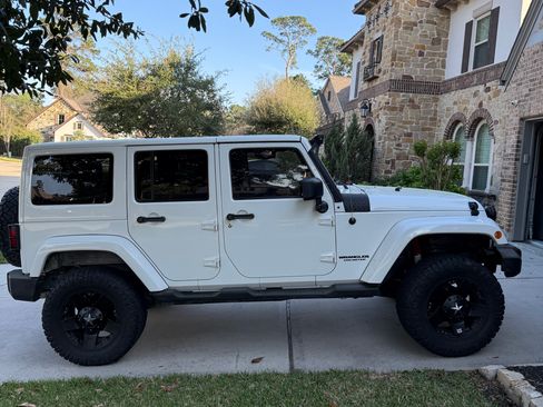 Used 2011 Jeep Wrangler Unlimited Sport image 1