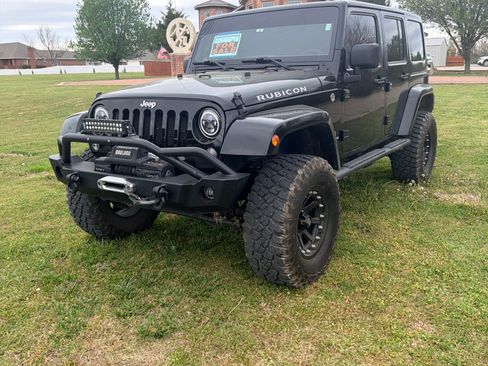 Used 2015 Jeep Wrangler Unlimited Rubicon w/ Dual Top Group image 1
