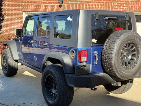 Used 2009 Jeep Wrangler Unlimited Rubicon w/ Dual Top Group image 4