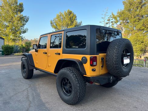 Used 2012 Jeep Wrangler Unlimited Sport w/ Black Appearance Group AWD/4WD image 11