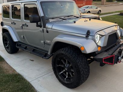 Used 2014 Jeep Wrangler Unlimited Sahara w/ Dual Top Group