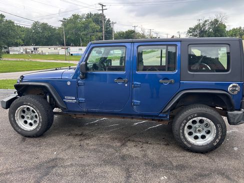 Used 2010 Jeep Wrangler Unlimited Sport AWD/4WD image 1