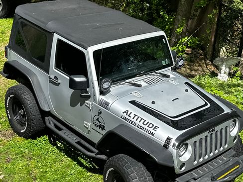Used 2012 Jeep Wrangler Sahara AWD/4WD image 1