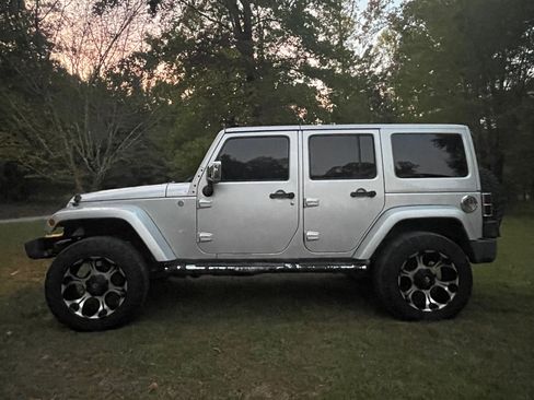 Used 2012 Jeep Wrangler Unlimited Sahara w/ Mopar Chrome Edition Group image 2