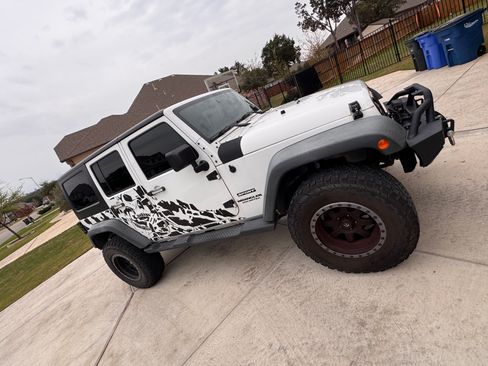 Used 2012 Jeep Wrangler Unlimited Sport image 1