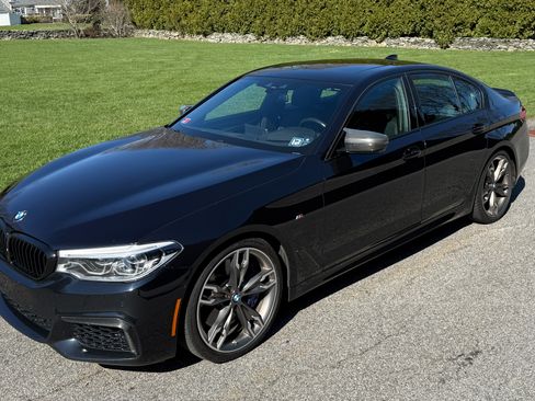 Used 2020 BMW M550i xDrive w/ Premium Package image 1