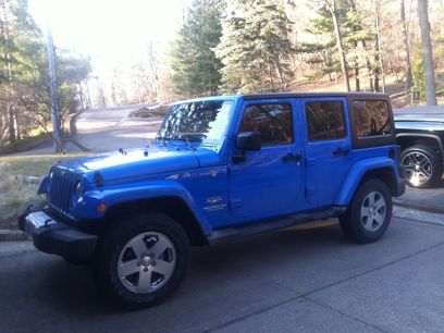 Used 2011 Jeep Wrangler Unlimited Sahara w/ Dual Top Group