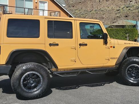 Used 2013 Jeep Wrangler Unlimited Rubicon w/ Dual Top Group image 1