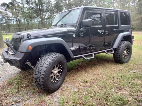 Used 2012 Jeep Wrangler Unlimited Sport image 2