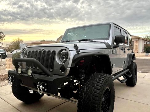 Used 2013 Jeep Wrangler Unlimited Sport image 1