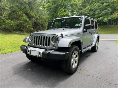 Used 2015 Jeep Wrangler Unlimited Sahara w/ Dual Top Group