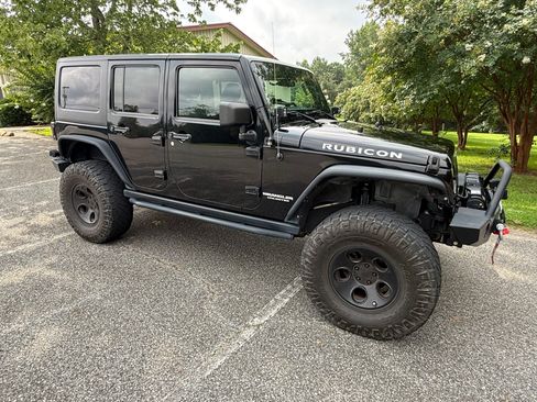 Used 2012 Jeep Wrangler Unlimited Rubicon w/ Dual Top Group AWD/4WD image 4