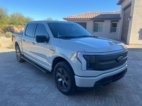 Used 2023 Ford F150 Lightning XLT w/ Equipment Group 312A High image 1