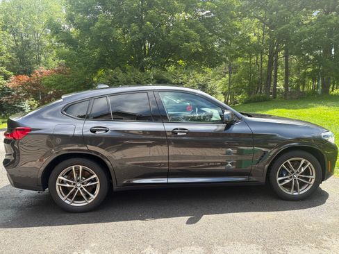 Used 2021 BMW X4 M40i w/ Parking Assistance Package AWD/4WD image 1