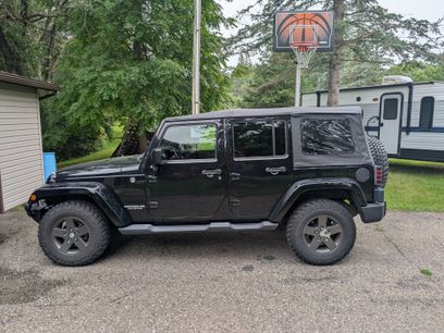 Used 2011 Jeep Wrangler Unlimited Sport w/ Dual Top Group