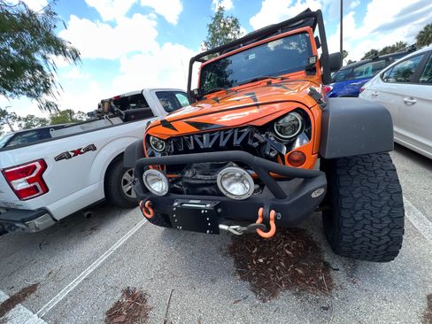 Used 2012 Jeep Wrangler Unlimited Sport image 1