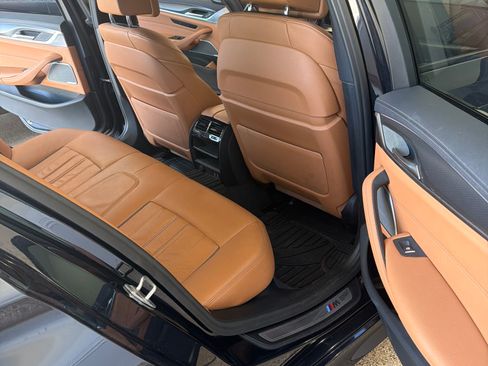 Used 2022 BMW M550i xDrive w/ Premium Package image 1