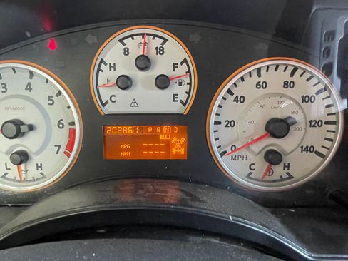 Used 2010 Nissan Titan PRO-4X w/ Pro-4x Premium Utility Pkg image 13