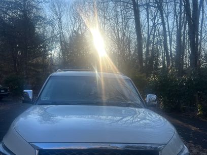 Used 2015 INFINITI QX80 4WD w/ Deluxe Technology Package